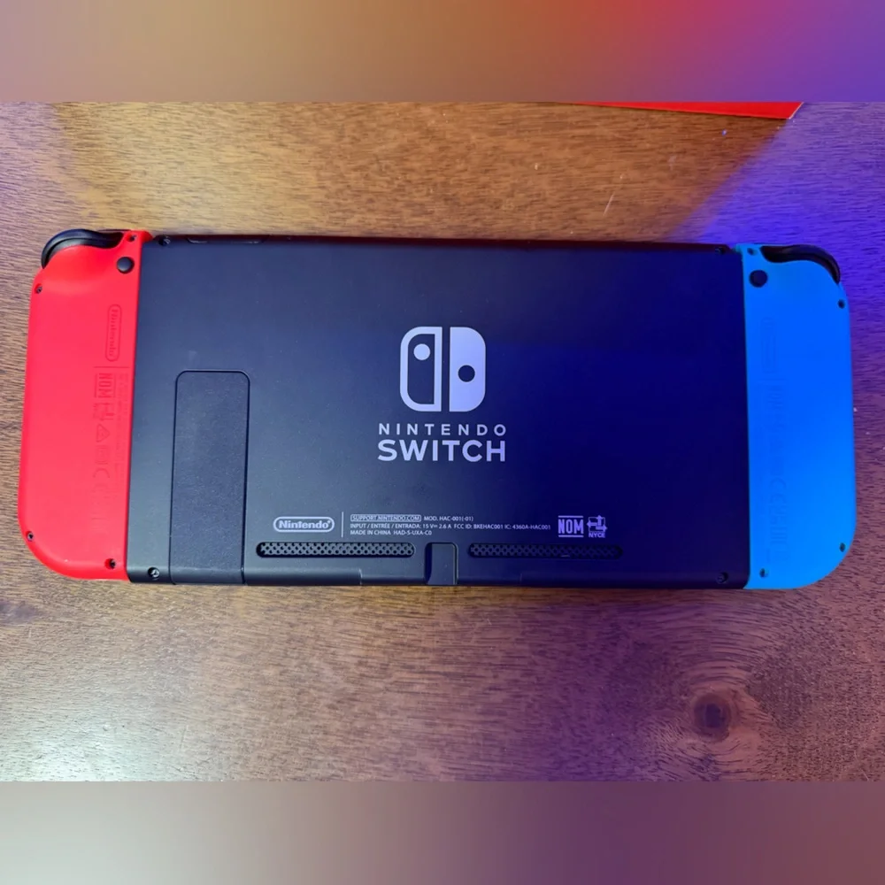 Nintendo Switch Console with Red and Blue Joy-Con